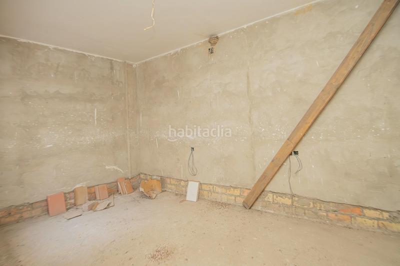 Foto 7caba25c-2e55-4b5b-b54f-50a2f817641a. Maison jumelée avec parking dans Palmete Sevilla