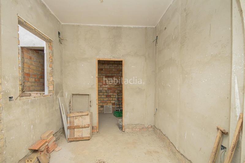 Foto a56d3e38-ee1f-4df8-88fd-b7bb7d44cc39. Maison jumelée avec parking dans Palmete Sevilla