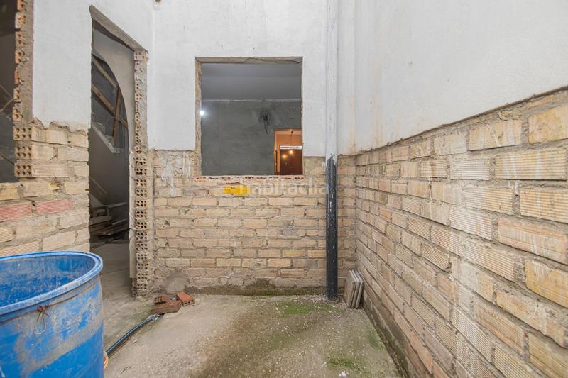 Foto aac36a2a-32f5-41a7-bc95-e62403bd35b3. Maison jumelée avec parking dans Palmete Sevilla