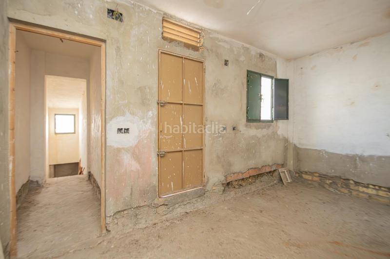 Foto b9daf1be-8720-46a5-bde7-87c0c592ed02. Maison jumelée avec parking dans Palmete Sevilla