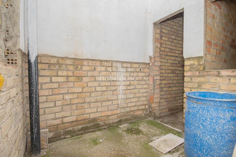 Foto cc54e4c5-1625-4196-84f8-8ebef1361608. Maison jumelée avec parking dans Palmete Sevilla