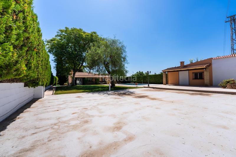 Foto b4e8842e-7c80-44ca-86d3-67d2b7cd9f06. Xalet amb calefacció aparcament piscina a Palomares del Río