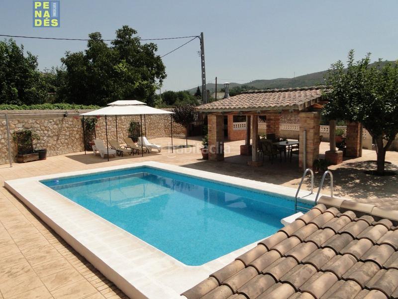 Foto bff9f01b-ebf7-4a7f-8bbf-13f0214575c1. House with heating pool in El Llombo Ontinyent