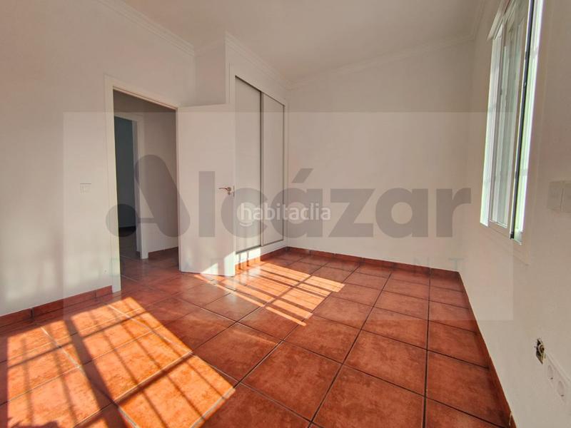 Foto ceacc78c-3ffd-42d4-82d8-ad5132bcc0c1. Chalet avec parking dans Nueva Alcalá Alcalá de Guadaira