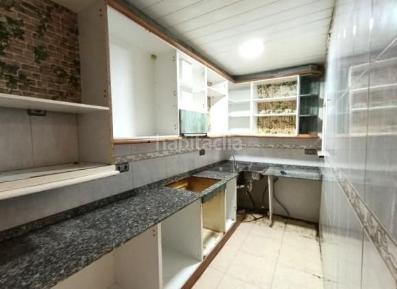 Foto f173c78c-7eb4-4ac3-bc47-adab63ac6365. Casa adossada a Poble Nou Terrassa