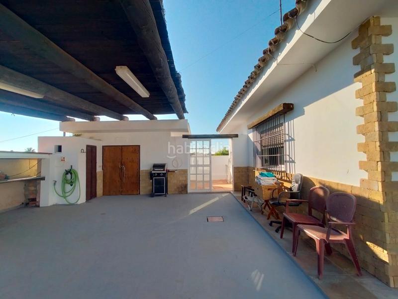 Foto eaa7c5fc-30c4-4456-9c49-1bb6cd4cd6fd. Xalet amb xemeneia aparcament piscina a Cuatro Pinos - El Carmen Puerto de Santa María (El)