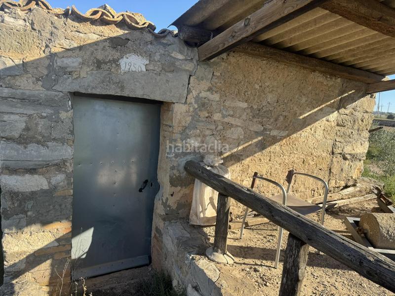 Foto c103d9dc-b6b0-41e1-b610-c0c0662d8151. Terreno residencial finca rústica con olivos y cabana. bellveí lleida en Sant Guim de la Plana