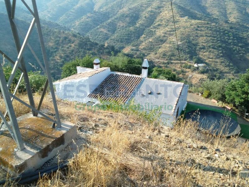 Foto b86b54bb-fc3f-45c1-bfad-21d5a92c1566. Masia amb aparcament piscina a Pinares de San Antón Málaga