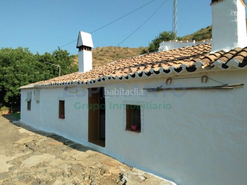 Foto cf992e84-d71d-4287-9c89-c98d1f0bc746. Masia amb aparcament piscina a Pinares de San Antón Málaga