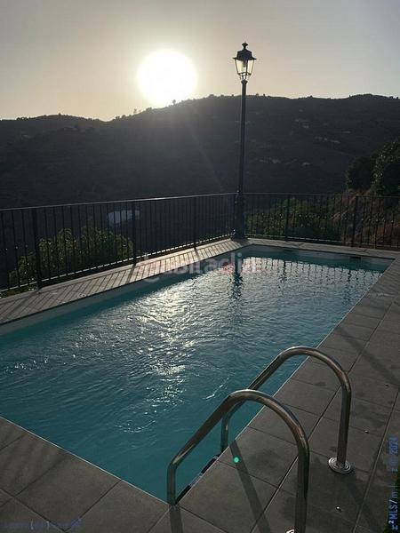 Foto 4c28ad84-90ec-49c2-82e7-a5d69a143b8c. Casa amb aparcament piscina a Torrox pueblo Torrox