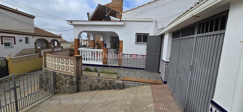 Foto b7918252-d635-48e2-81c3-606841c38fe2. Casa amb aparcament a Benajarafe