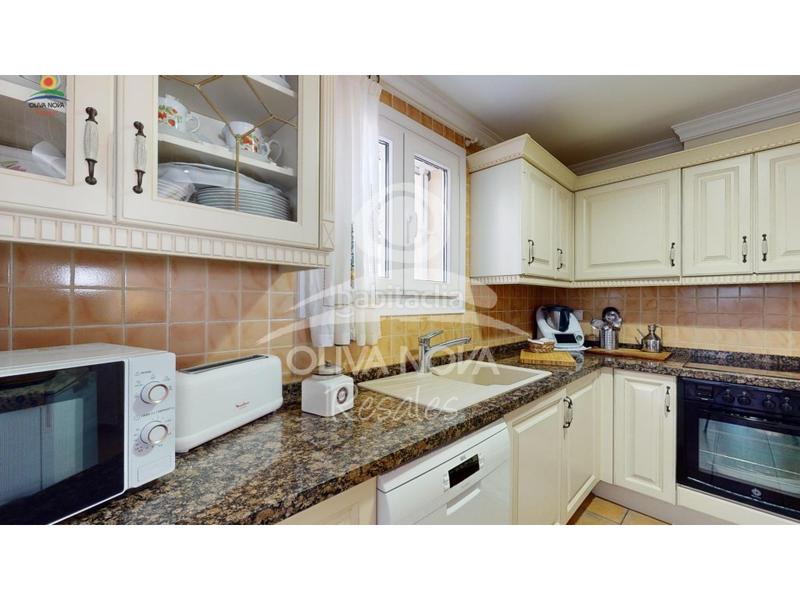 Foto 71a70f6c-15fd-4efc-85a0-abe0e80557f7. Maison avec parking dans Oliva nova Oliva