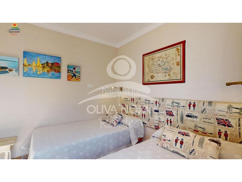 Foto 8e8df0cc-ad40-4e33-9312-96b006f76051. Maison avec parking dans Oliva nova Oliva