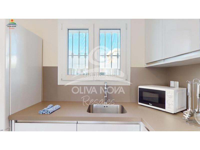 Foto 1ea535bc-6f27-4e00-8002-09de7afb9d3a. Casa adosada malibú beach iii, 17 en Oliva nova Oliva