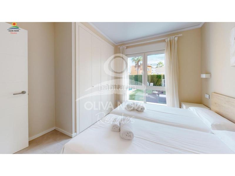 Foto 97daa8ab-ed62-44aa-912a-5ca7f8fc30ba. Casa adosada malibú beach iii, 17 en Oliva nova Oliva