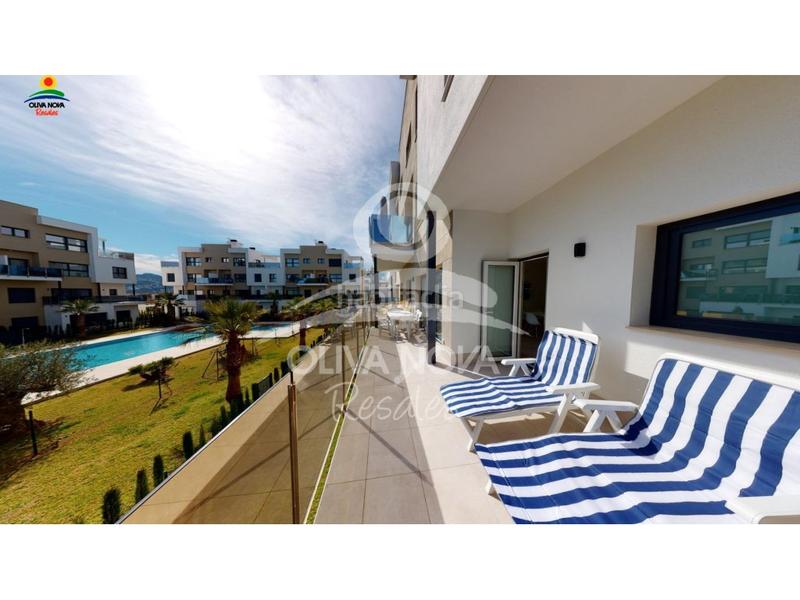 Foto 727570f8-2c6e-4acc-86c9-bda62103e36e. Appartement avec chauffage parking piscine dans Oliva nova Oliva