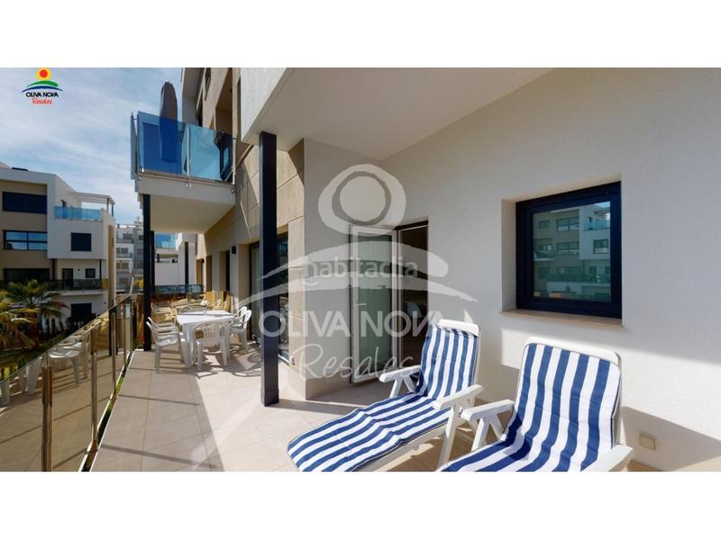Foto cd1f953a-56a5-4809-b255-c056d4a9484f. Appartement avec chauffage parking piscine dans Oliva nova Oliva