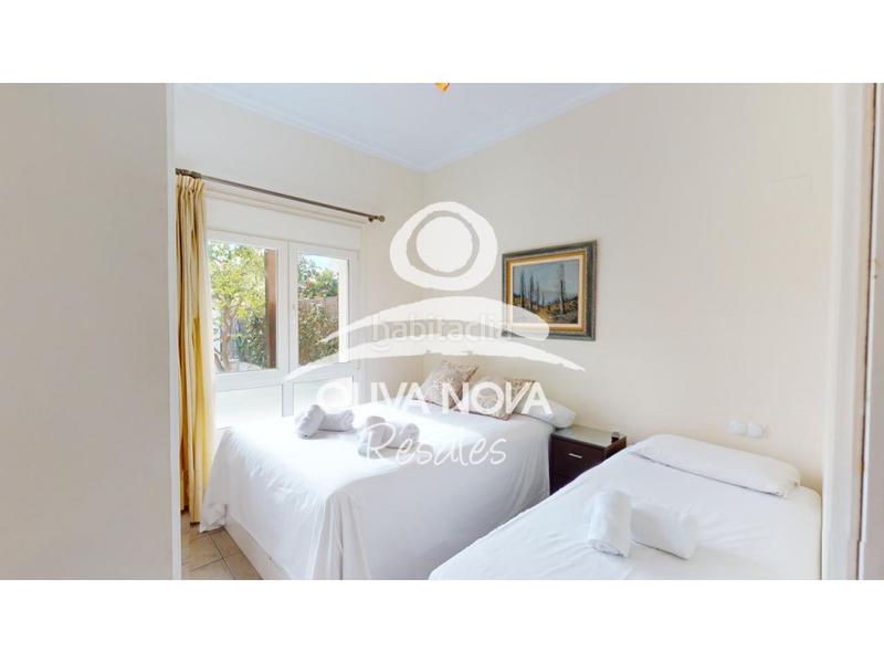 Foto 167ed22a-8177-4ec8-8ef7-088fa1ae9ca6. Casa adossada amb piscina a Oliva nova Oliva