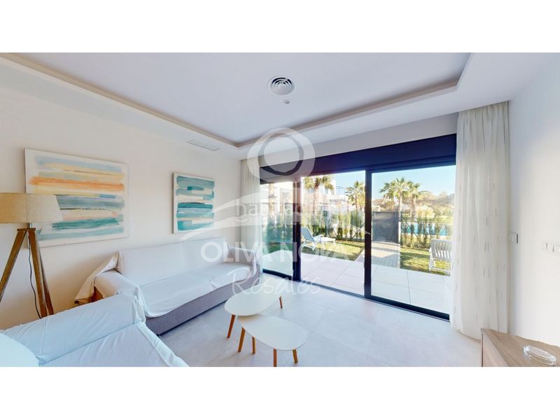 Foto a9eed2b2-fa5a-48a9-835e-db73b0fd17fb. Casa adossada amb aparcament a Oliva nova Oliva