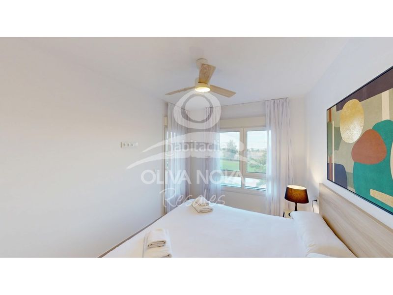 Foto 8edd711c-2449-4f17-be2e-7cbe746a0de9. Apartament amb aparcament piscina a Oliva nova Oliva