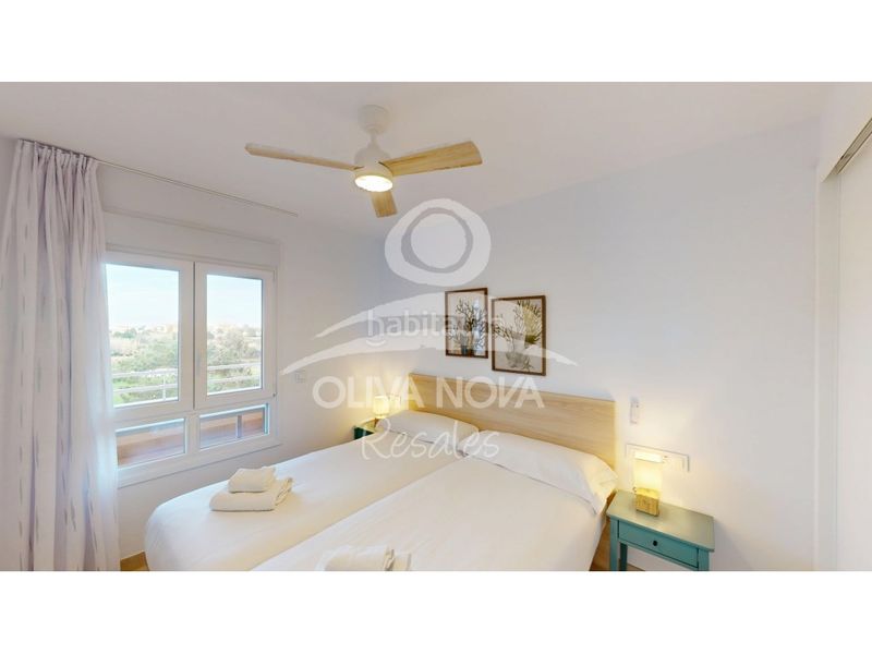 Foto b3ca87ff-019b-4a5a-975d-08bdd68a543e. Apartament amb aparcament piscina a Oliva nova Oliva