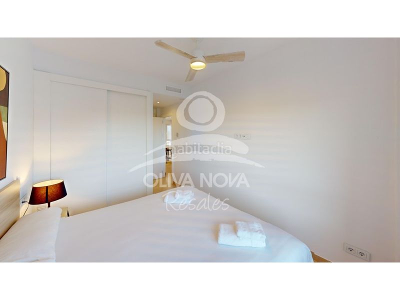 Foto 9fd98401-1de3-4676-8318-5c5fc0b57096. Apartament amb aparcament piscina a Oliva nova Oliva