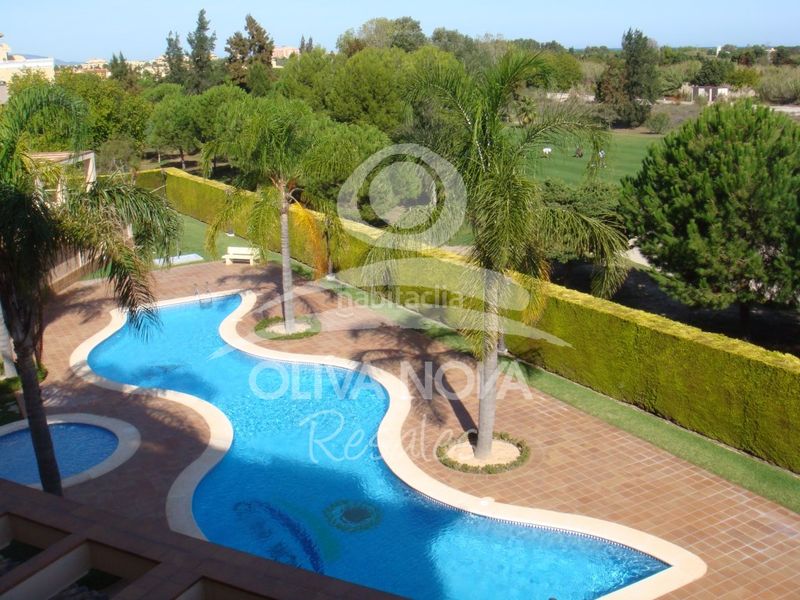 Foto e6bca465-cc73-4bbc-b258-288fc82d1cc8. Apartament amb aparcament piscina a Oliva nova Oliva