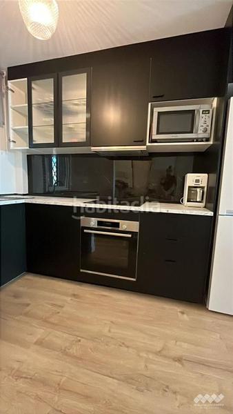 Foto a5ebc43a-be94-4b28-b4dd-a5a90f5e42a2. Piso  en venta totalmente reformado en Cabopino - Artola Marbella