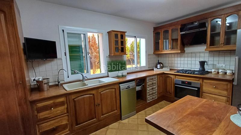 Foto b417aaec-f03c-4145-9d24-4fbb73e3e296. Chalet fantastico chalet unifamiliar con piscina y jardin privado. en Llucmajor