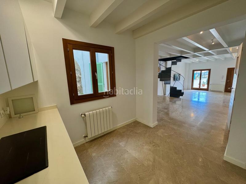 Foto d1981277-392a-4dbe-a5dd-32e6d69b2ad8. Casa adossada amb calefacció aparcament a Alaró