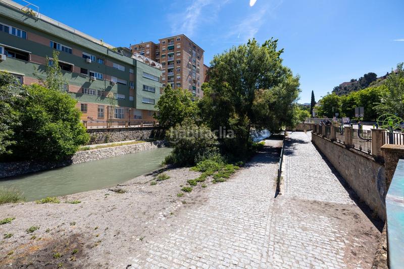 Foto d3c96ab2-7030-4dcb-a985-e51d75ad8da5. Rural plot in Cenes de la Vega