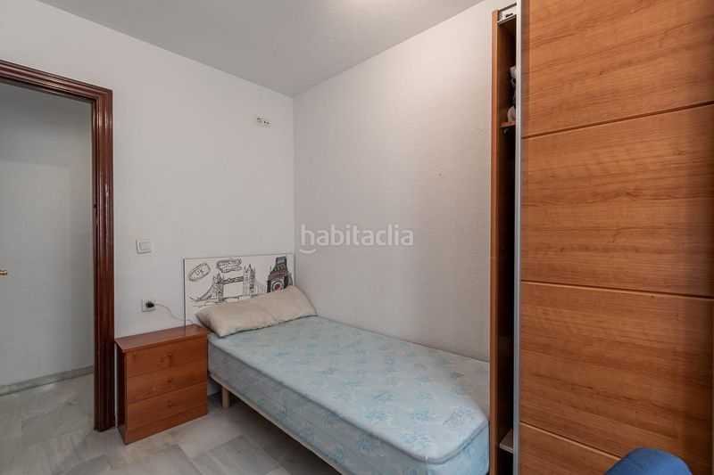 Foto 7d9f5391-1b9f-47c5-8fdb-8fe9f59f5392. Pis amb calefacció aparcament a Bola de Oro Granada