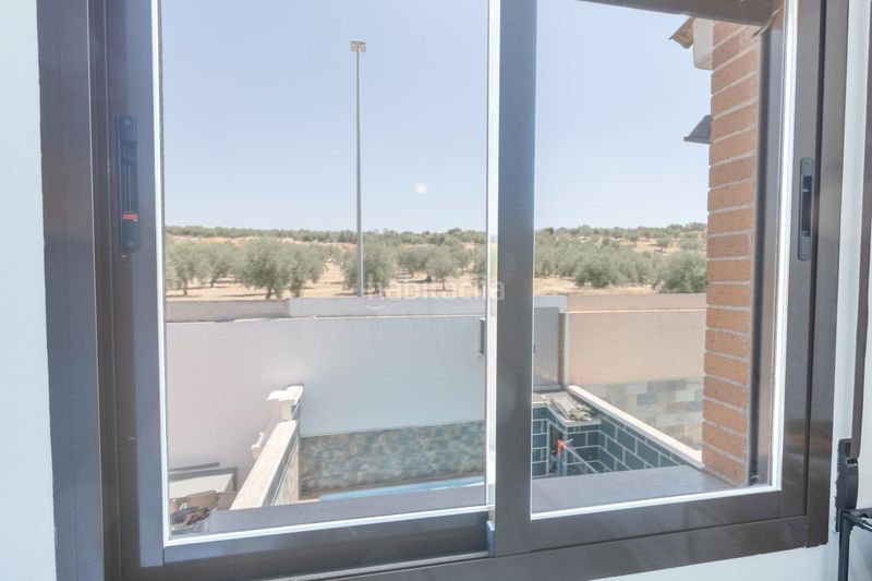 Foto 727e5df8-cfda-43d9-8f1a-4b6372317520. Casa adosada vive en la joya! amplia casa adosada con piscina privada en Pulianas