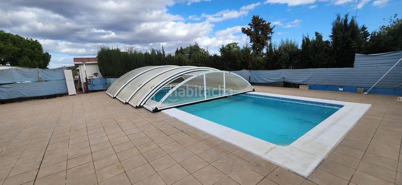 Foto b1831f4d-e416-4e48-9cb9-9bc8f8b42523. Country house with pool in Gibraleón