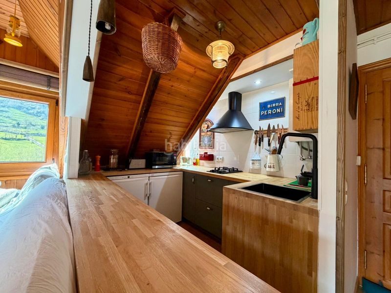 Foto b2876d57-eacf-4976-bab7-d34b7fcd6cc4. Dúplex amb xemeneia calefacció a Vielha Vielha e Mijaran