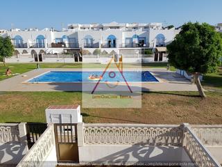 Casa adossada a Sant Agustí-Cala de Bou. Estupendo adosado con piscina comunitaria en cala de bou