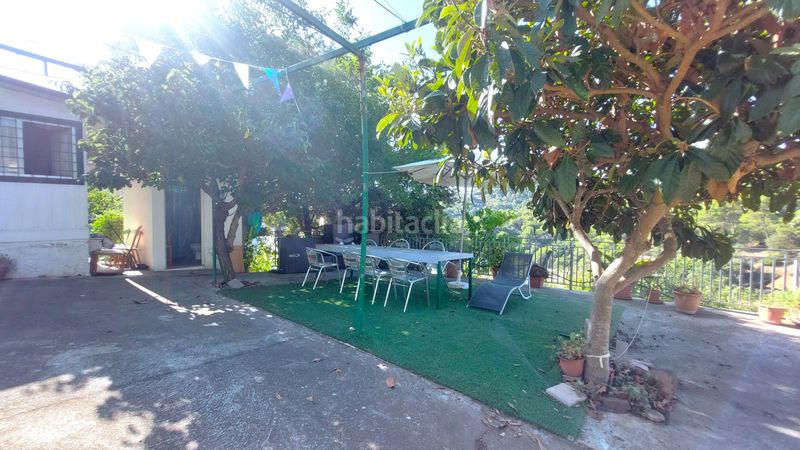 Foto f7401479-78cb-4396-aeaf-d384d385278f. Chalet with fireplace heating in Sant Llorenç Savall