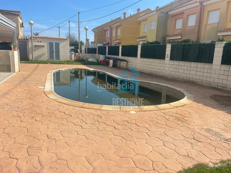 Foto ea027e9a-5248-462b-8bfa-70eeef4235b1. Reihenhaus mit pool in El Marenyet Cullera