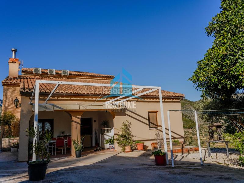 Foto c7b92d1e-ecf2-4d4f-aed0-866950be1459. Chalet impresionante finca rústica con piscina y vistas panorámicas en benisa en Benissa