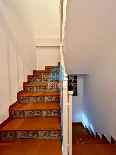 Foto 01e764d7-a059-4e5a-8b4e-affc9cc3ebd6. Reihenhaus mit parking in El Marenyet Cullera