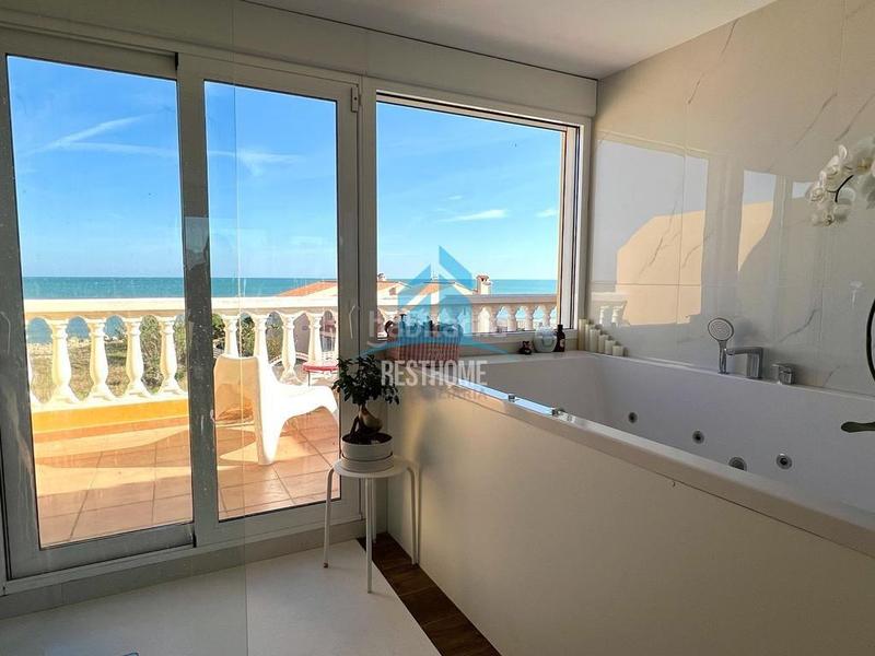 Foto 433e8b2e-7734-45ee-a0e8-de327f3e589b. Reihenhaus mit parking in El Marenyet Cullera