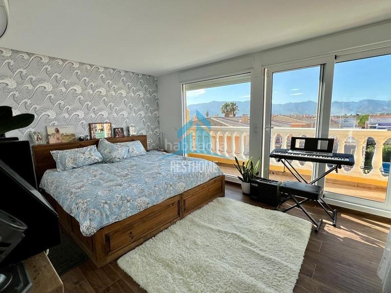 Foto 4f175702-84f5-4855-900d-7c9ffd505de6. Reihenhaus mit parking in El Marenyet Cullera