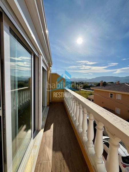 Foto e21b2e3d-018e-4f3d-a903-405ce4b26f18. Reihenhaus mit parking in El Marenyet Cullera