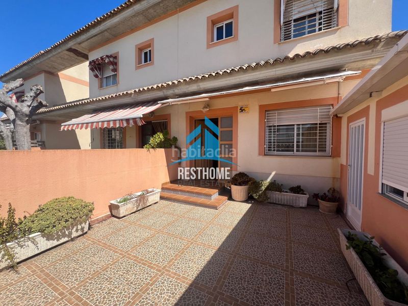 Foto 493cbd58-37e0-41a2-9201-a5bc580c241f. Casa adossada amb aparcament a El Marenyet Cullera