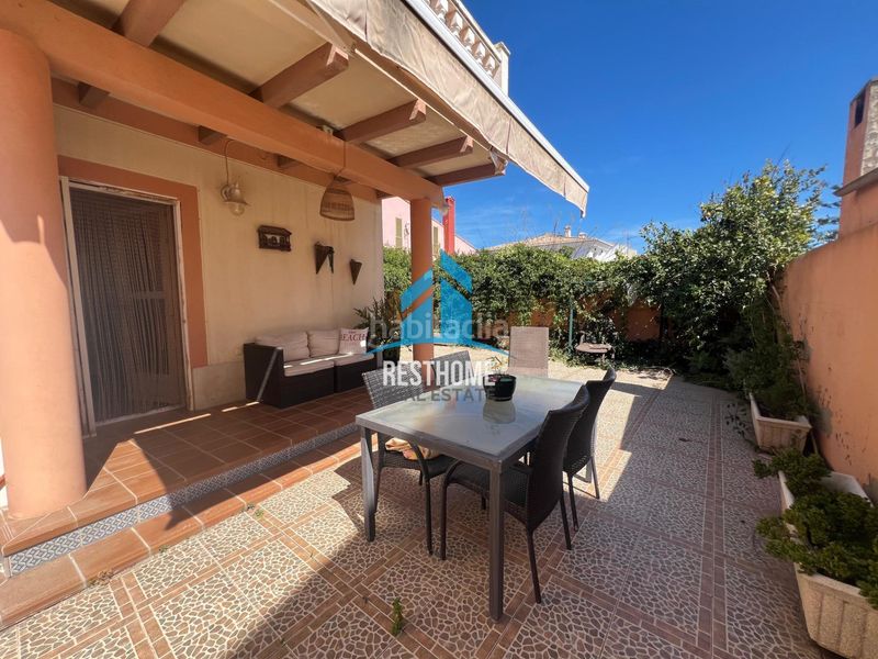 Foto a93ae56c-371d-4639-bfd7-616956989e5d. Casa adossada amb aparcament a El Marenyet Cullera