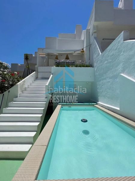 Foto fe96349f-e2c1-41ff-81a2-56de35c9d77e. Casa adossada amb piscina a Marina Botafoc-Talamanca Ibiza