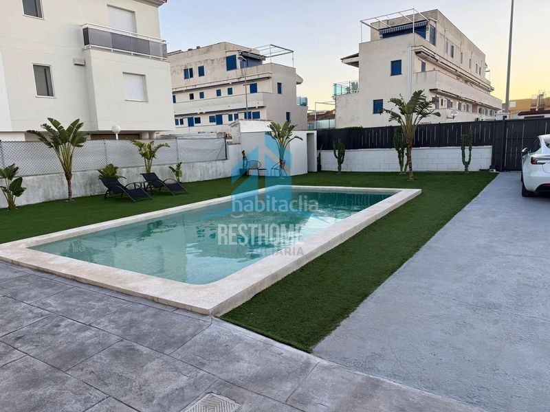 Foto f0a5012d-b228-4087-ac3e-34afc2fd2e25. Xalet amb calefacció aparcament piscina a Oliva playa Oliva