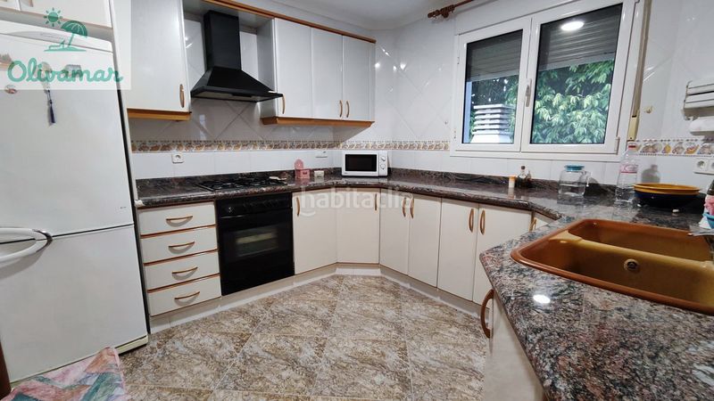 Foto 51e47ae1-2bc0-476a-bd65-aa11f49d1a5b. Chalet dans carrer de la juliola 8 dans Oliva playa Oliva