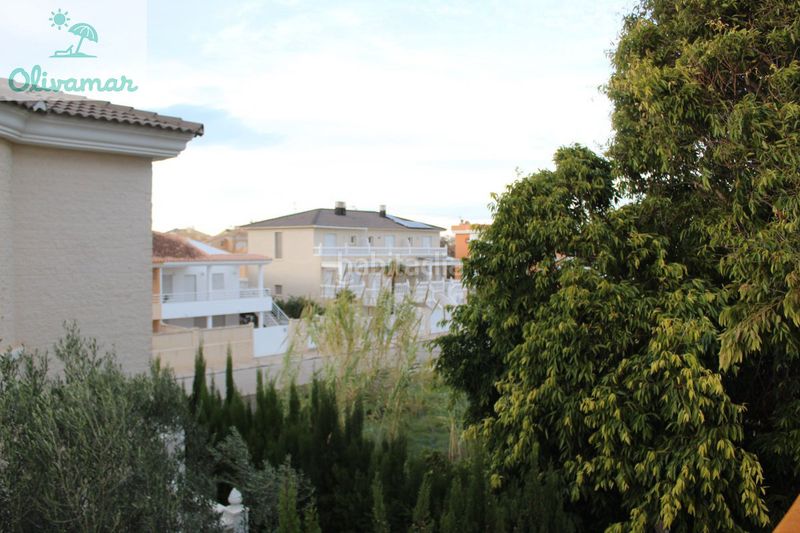Foto b37e6702-9f35-4c90-a409-d860afab1084. Chalet dans carrer de la juliola 8 dans Oliva playa Oliva