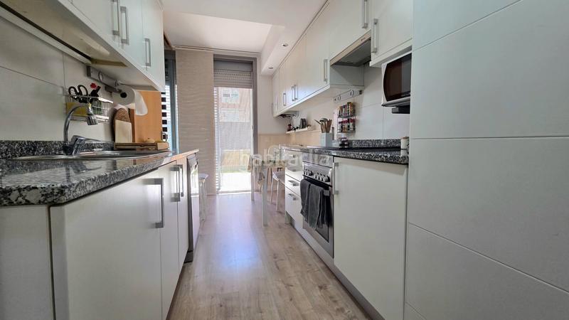 Foto c1d1e383-ec55-49f1-8068-bd8d6a5ac57b. Planta baixa amb calefacció aparcament piscina a Parla